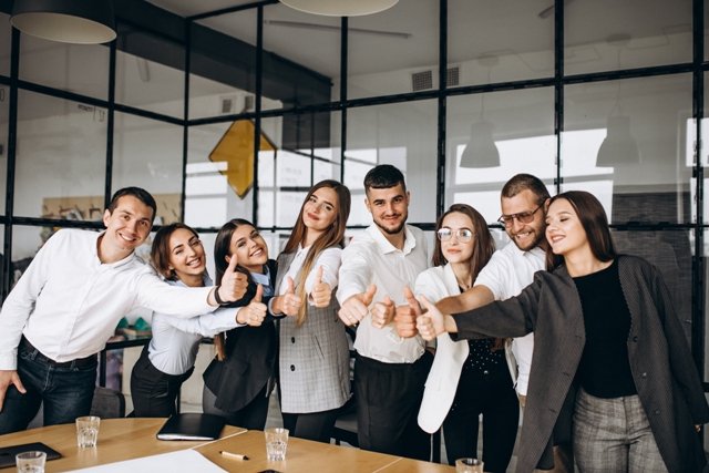 group-of-people-working-out-business-plan-in-an-office